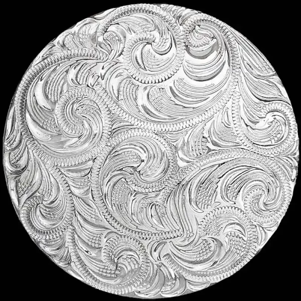 The Engraved Concho  is a true embodiment of Western craftsmanship.. Crafted with high quality German Silver and detailed with beautiful scrollwork.
